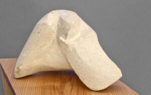 Sitzender Mensch, stilisierte Form